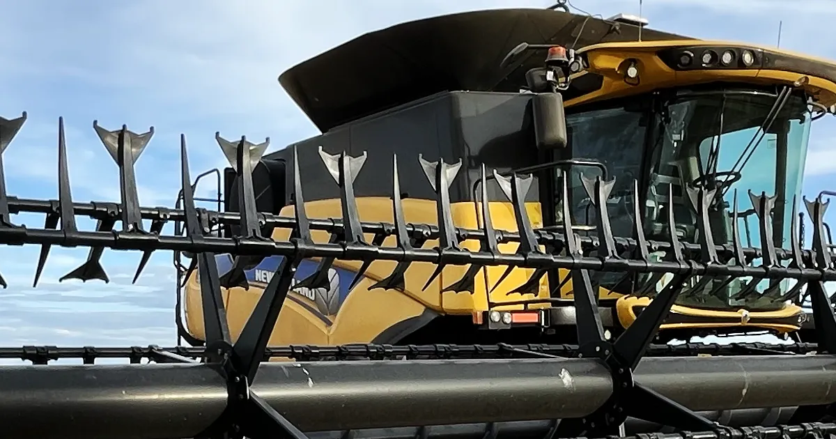 Duck Foot paddle tines installed on combine header