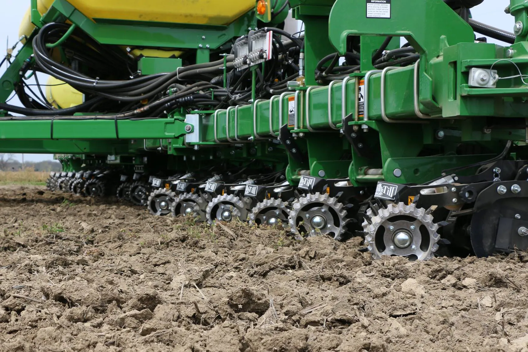 Martin-Till floating row cleaners in field