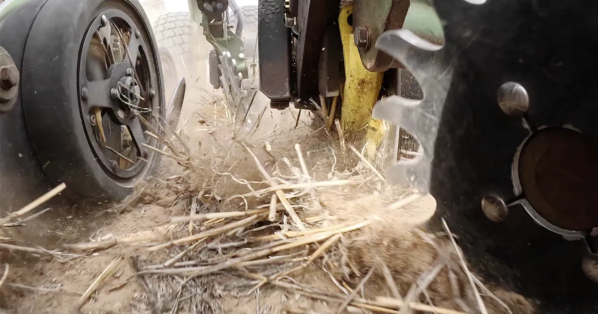 air seeder with spoked gauge wheel and seed boot